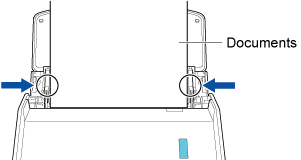 Ajustement des guides latéraux